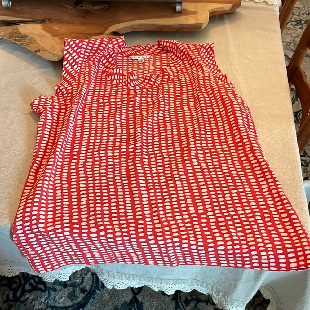 Cabi, women’s orange and white sleeveless blouse. Size medium